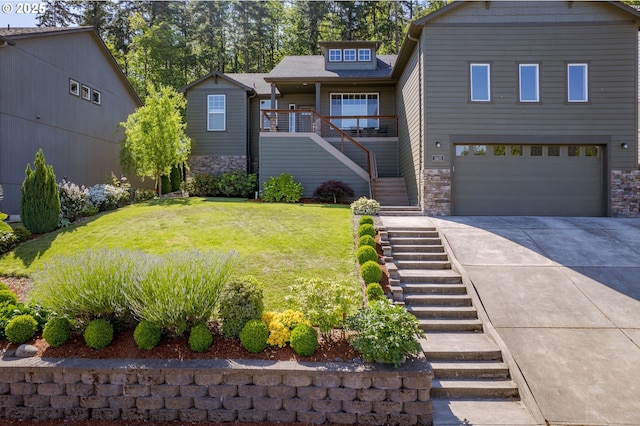 3625 Snowberry Rd, Eugene, OR 97403 - view of front facade with stairs, stone siding, a garage, and driveway