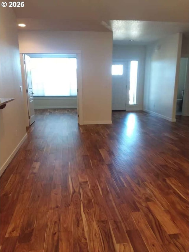 3625 Snowberry Rd, Eugene, OR 97403 - unfurnished room with dark wood-style flooring and baseboards