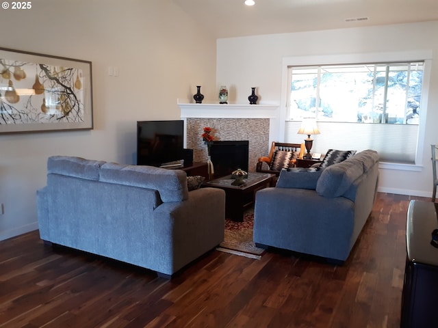 3625 Snowberry Rd, Eugene, OR 97403 - living room featuring dark wood-style flooring, a tiled fireplace, recessed lighting, and lofted ceiling