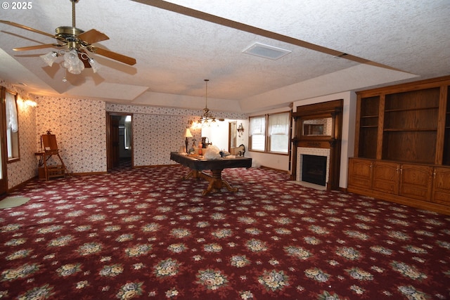 1397 State Route 506, Vader, WA 98593 - recreation room with carpet, a textured ceiling, billiards, a ceiling fan, and a fireplace
