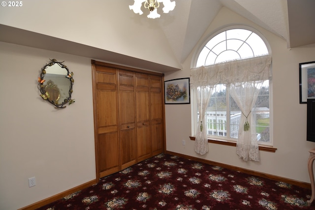 1397 State Route 506, Vader, WA 98593 - entrance foyer featuring a chandelier, dark colored carpet, and high vaulted ceiling
