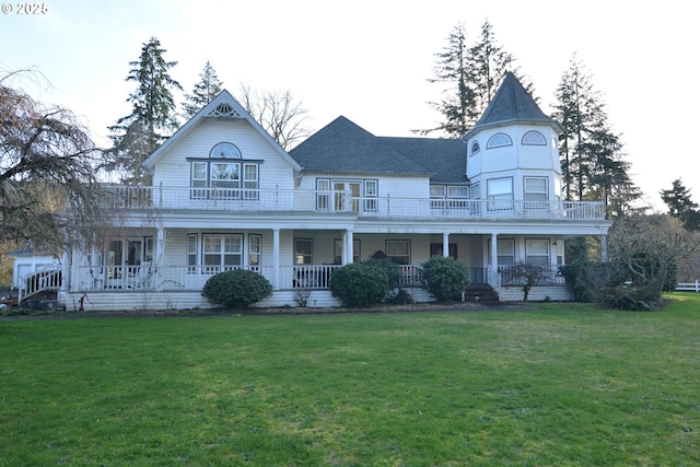 1397 State Route 506, Vader, WA 98593 - victorian house featuring covered porch, a front yard, a balcony, and a shingled roof