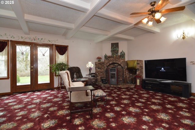 1397 State Route 506, Vader, WA 98593 - carpeted living area with coffered ceiling, beamed ceiling, a fireplace, and ceiling fan