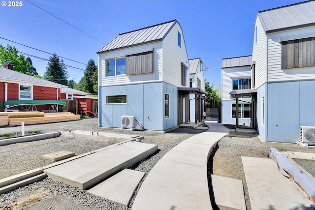 45 W 27th Ave Unit B, Eugene, OR 97405 - back of property featuring a standing seam roof, metal roof, and a cooling unit