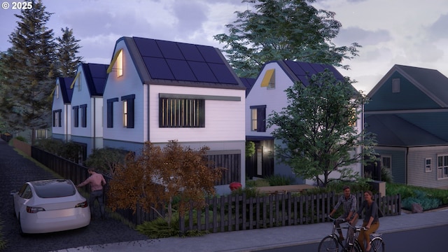 45 W 27th Ave Unit B, Eugene, OR 97405 - view of front facade featuring metal roof, a standing seam roof, and solar panels