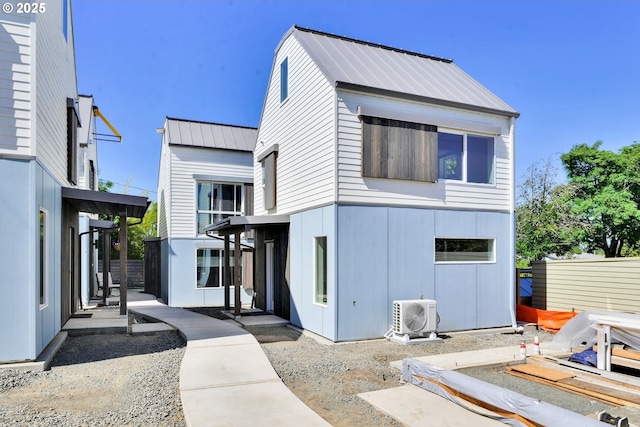 45 W 27th Ave Unit B, Eugene, OR 97405 - modern home with a cooling unit and metal roof