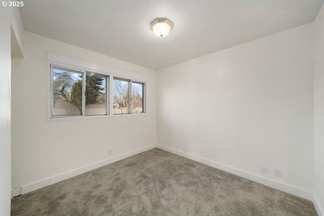 unfurnished room featuring carpet flooring