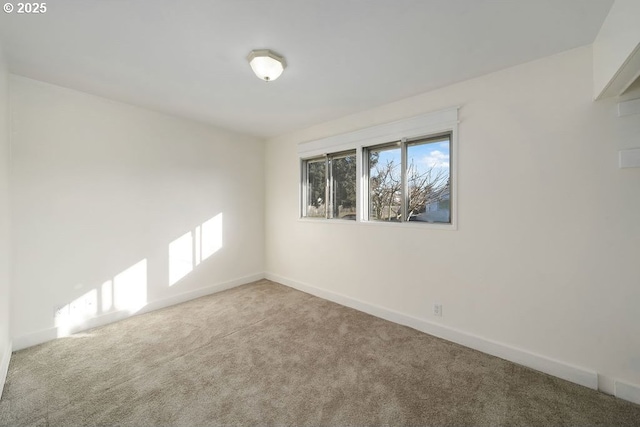 empty room featuring carpet floors