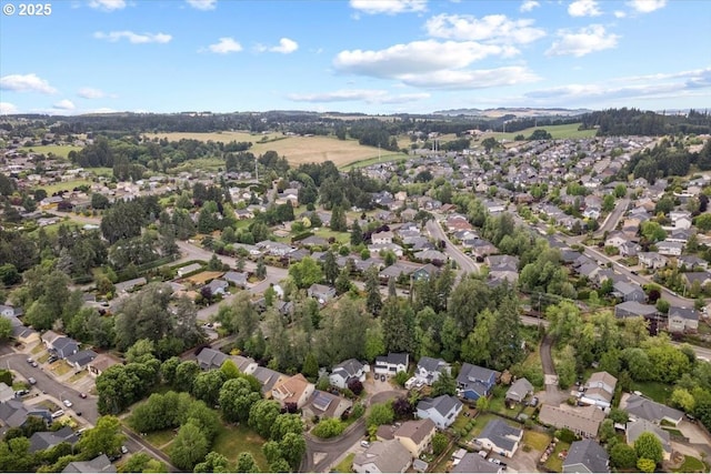 aerial view of property's location with nearby suburban area