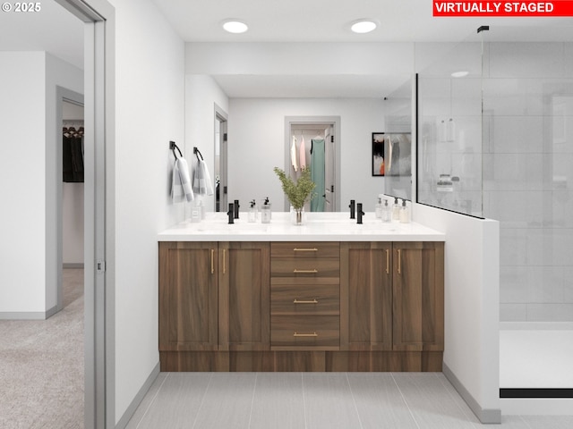 247 NW 29th Way, Battle Ground, WA 98604 - full bathroom with a tile shower, double vanity, baseboards, and recessed lighting