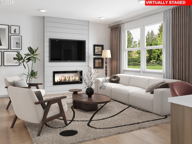 247 NW 29th Way, Battle Ground, WA 98604 - living room with wood finished floors, a fireplace, and recessed lighting