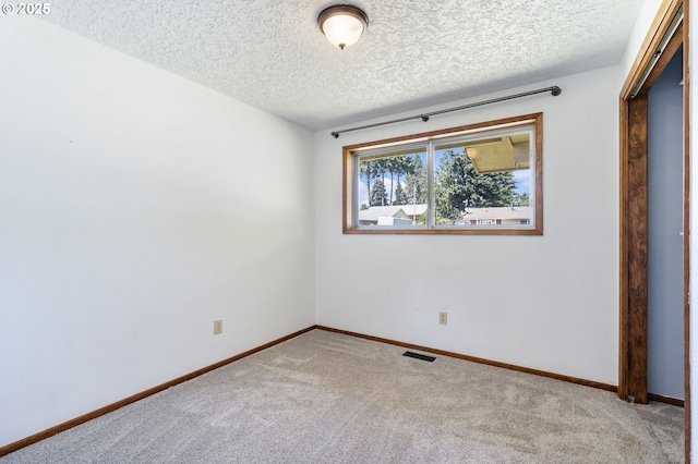 15605 SE 5th St, Vancouver, WA 98684 - spare room featuring carpet floors and a textured ceiling