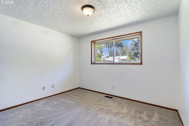 15605 SE 5th St, Vancouver, WA 98684 - carpeted spare room featuring a textured ceiling