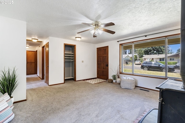 15605 SE 5th St, Vancouver, WA 98684 - interior space featuring carpet floors, ceiling fan, and a textured ceiling
