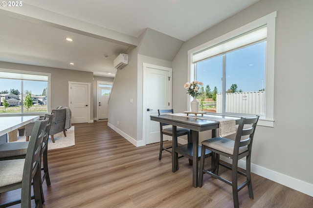 4027 SW Myrtle Aly Unit 7, Gresham, OR 97030 - dining room with recessed lighting, light wood-style flooring, baseboards, and a wall unit AC