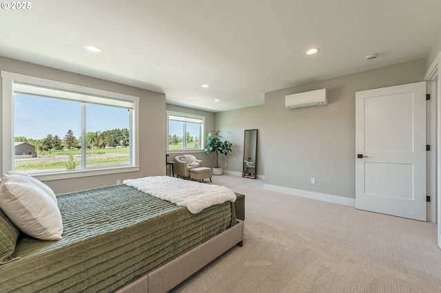 4027 SW Myrtle Aly Unit 7, Gresham, OR 97030 - bedroom featuring light colored carpet, baseboards, recessed lighting, and a wall unit AC