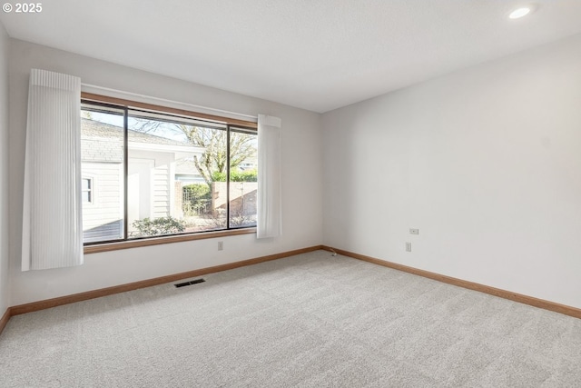 empty room with carpet floors