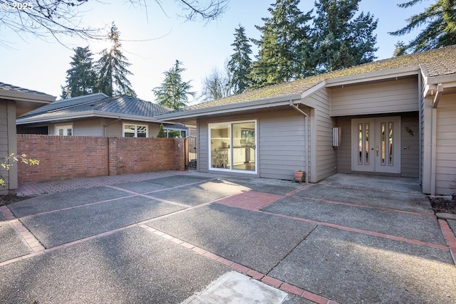 rear view of house featuring a patio