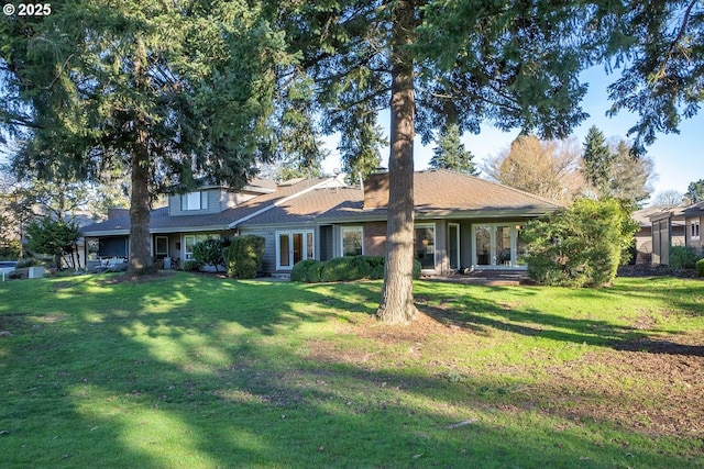 view of front of home with a front lawn