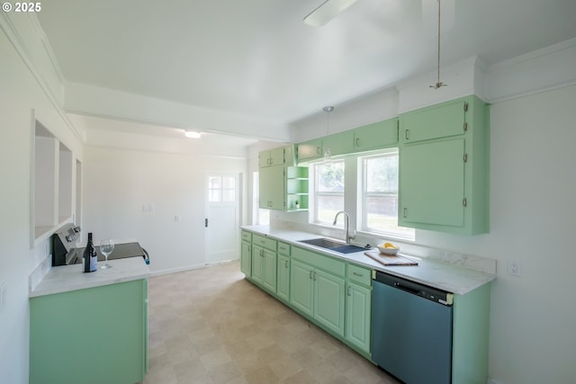 kitchen featuring dishwasher, a sink, green cabinetry, light countertops, and light floors