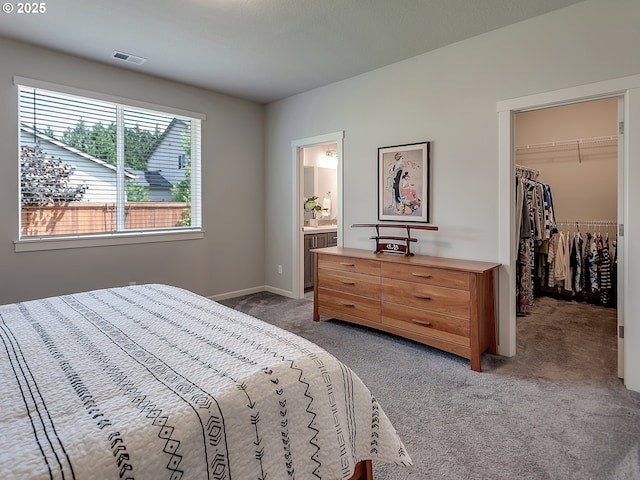 472 SW 16th Ave, Canby, OR 97013 - bedroom featuring light colored carpet, a spacious closet, a closet, and ensuite bathroom