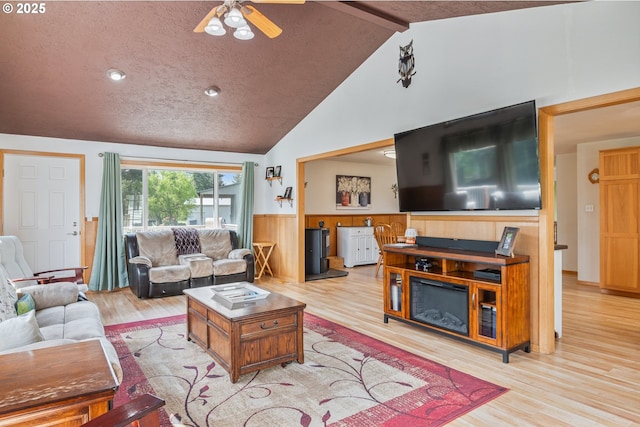 220 Plomondon Rd, Toledo, WA 98591 - living area with ceiling fan, lofted ceiling with beams, wainscoting, and wood finished floors