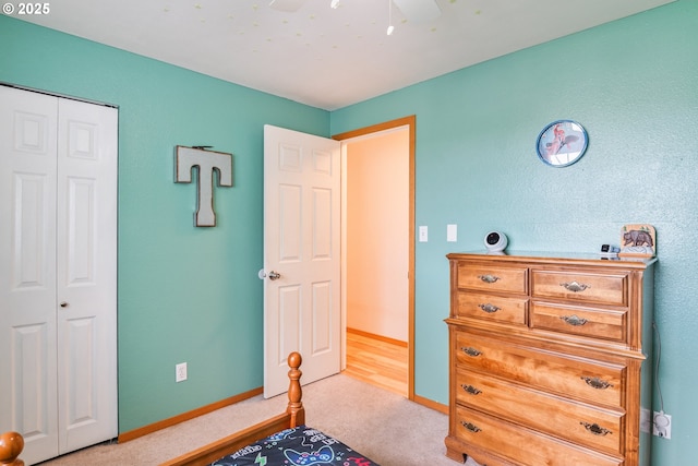 220 Plomondon Rd, Toledo, WA 98591 - carpeted bedroom with baseboards, a ceiling fan, and a closet