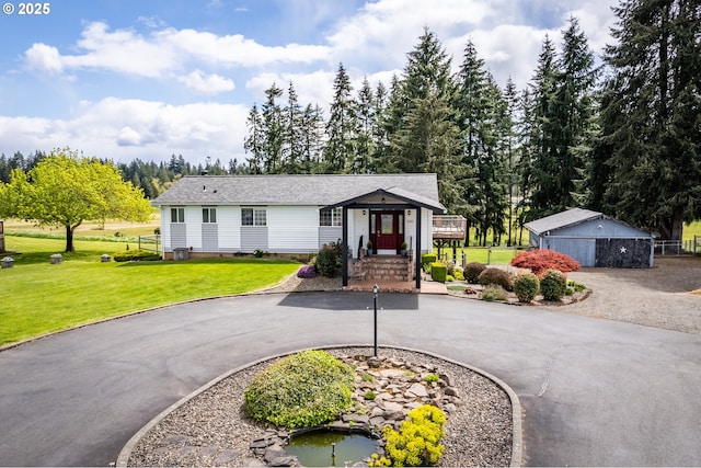220 Plomondon Rd, Toledo, WA 98591 - view of front of home with crawl space, curved driveway, and a front yard