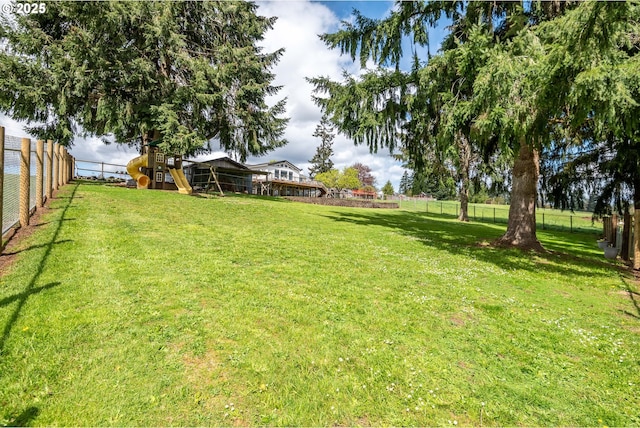 220 Plomondon Rd, Toledo, WA 98591 - view of yard with a fenced backyard and a playground