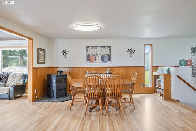 220 Plomondon Rd, Toledo, WA 98591 - dining room with wainscoting, wood finished floors, and wooden walls