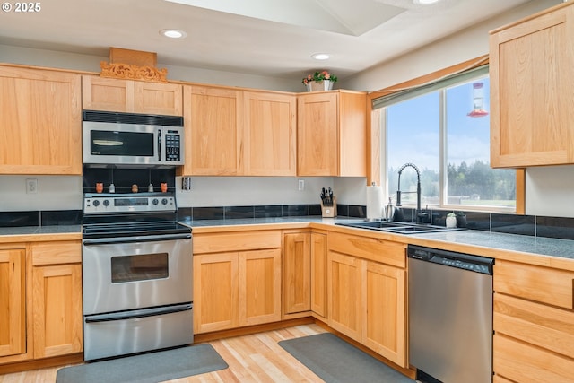 220 Plomondon Rd, Toledo, WA 98591 - kitchen with a sink, light brown cabinets, stainless steel appliances, recessed lighting, and light wood-style flooring