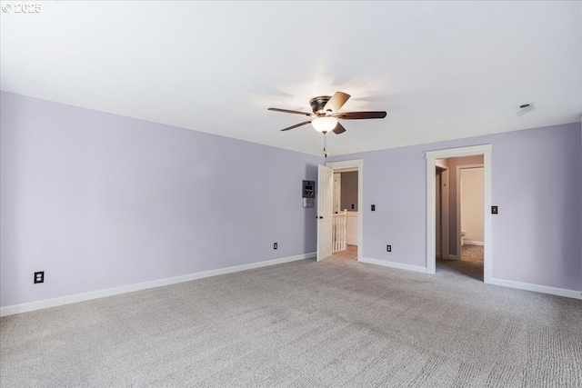 20606 NE 229th St, Battle Ground, WA 98604 - unfurnished bedroom featuring baseboards, light colored carpet, and ceiling fan