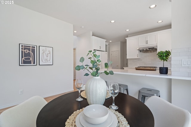 14067 Chatham Ct, Lake Oswego, OR 97035 - dining space with recessed lighting and light wood-style flooring