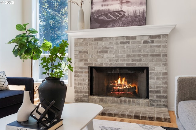 14067 Chatham Ct, Lake Oswego, OR 97035 - detailed view of a brick fireplace and wood finished floors
