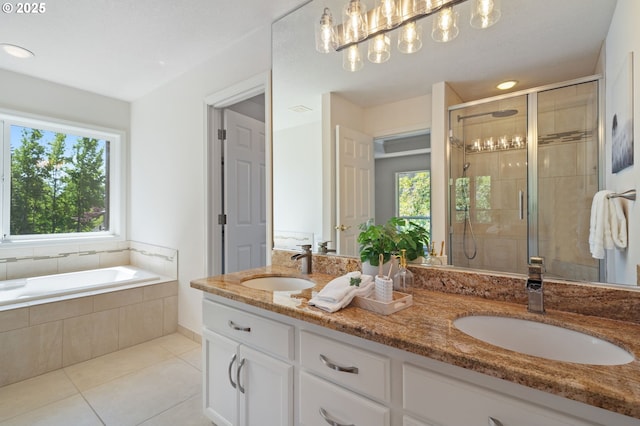 14067 Chatham Ct, Lake Oswego, OR 97035 - full bath featuring double vanity, a stall shower, tile patterned floors, a bath, and recessed lighting