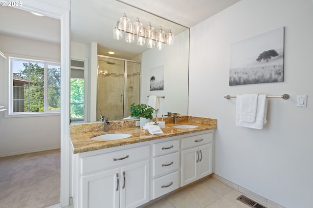 14067 Chatham Ct, Lake Oswego, OR 97035 - bathroom featuring a stall shower, double vanity, and tile patterned flooring