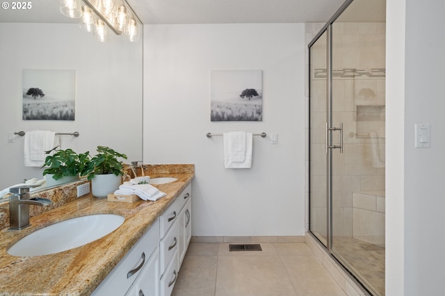 14067 Chatham Ct, Lake Oswego, OR 97035 - full bathroom featuring double vanity, a stall shower, and tile patterned flooring