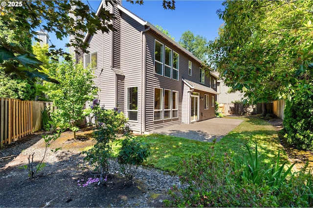 14067 Chatham Ct, Lake Oswego, OR 97035 - rear view of house with a fenced backyard and a patio