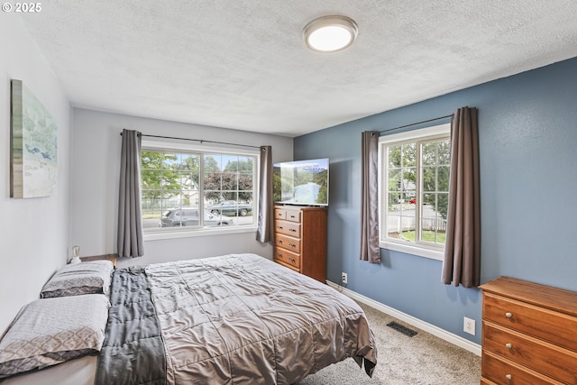 2064 Tualatin St, Saint Helens, OR 97051 - bedroom with a textured ceiling and carpet floors