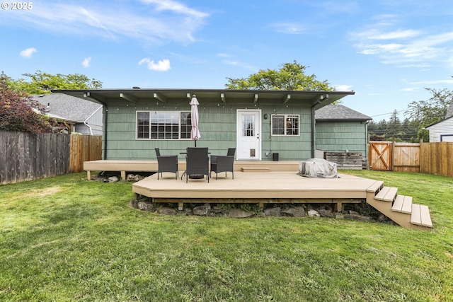 2064 Tualatin St, Saint Helens, OR 97051 - back of house featuring a fenced backyard and a wooden deck