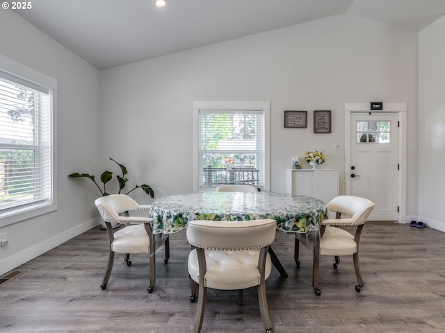 15807 SE Rainier Ave, Clackamas, OR 97015 - dining room with lofted ceiling, plenty of natural light, baseboards, and wood finished floors