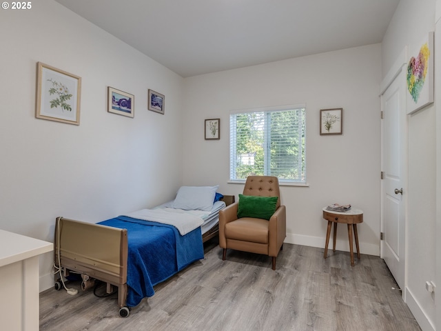 15807 SE Rainier Ave, Clackamas, OR 97015 - bedroom featuring light wood-style flooring and baseboards