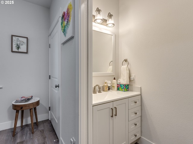 15807 SE Rainier Ave, Clackamas, OR 97015 - bathroom featuring vanity, wood finished floors, and baseboards