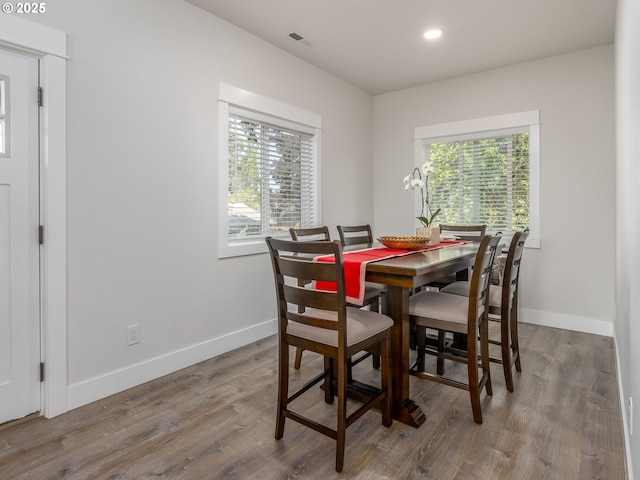 15807 SE Rainier Ave, Clackamas, OR 97015 - dining area featuring plenty of natural light, wood finished floors, baseboards, and recessed lighting