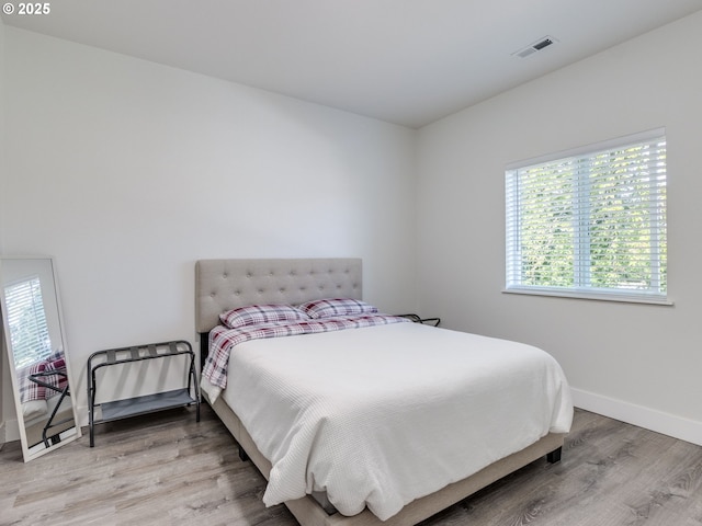 15807 SE Rainier Ave, Clackamas, OR 97015 - bedroom featuring light wood finished floors and baseboards