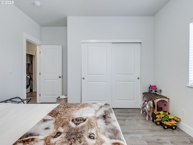 15807 SE Rainier Ave, Clackamas, OR 97015 - bedroom with a closet and light wood-style floors