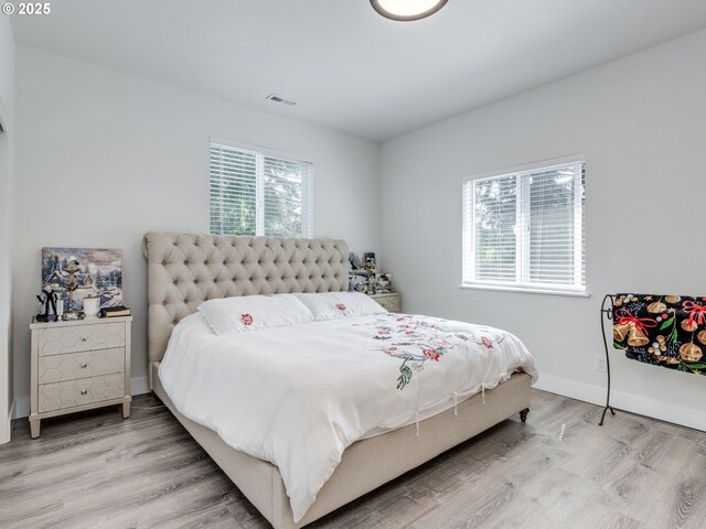 15807 SE Rainier Ave, Clackamas, OR 97015 - bedroom featuring light wood-type flooring and baseboards