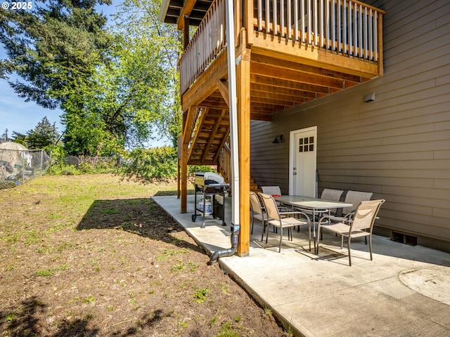 15807 SE Rainier Ave, Clackamas, OR 97015 - view of patio with a fenced backyard, outdoor dining area, a deck, stairway, and grilling area