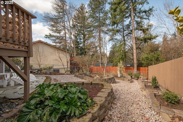 view of yard featuring a fenced backyard