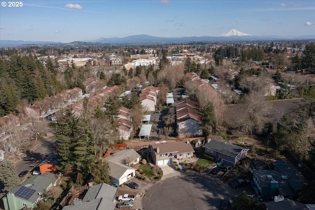 drone / aerial view with a residential view and a mountain view